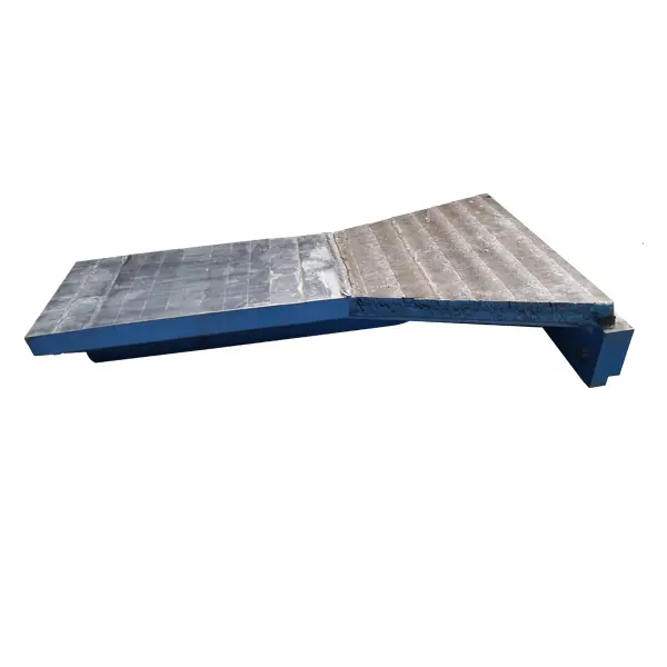 Side deflector for roller press/cheek plate