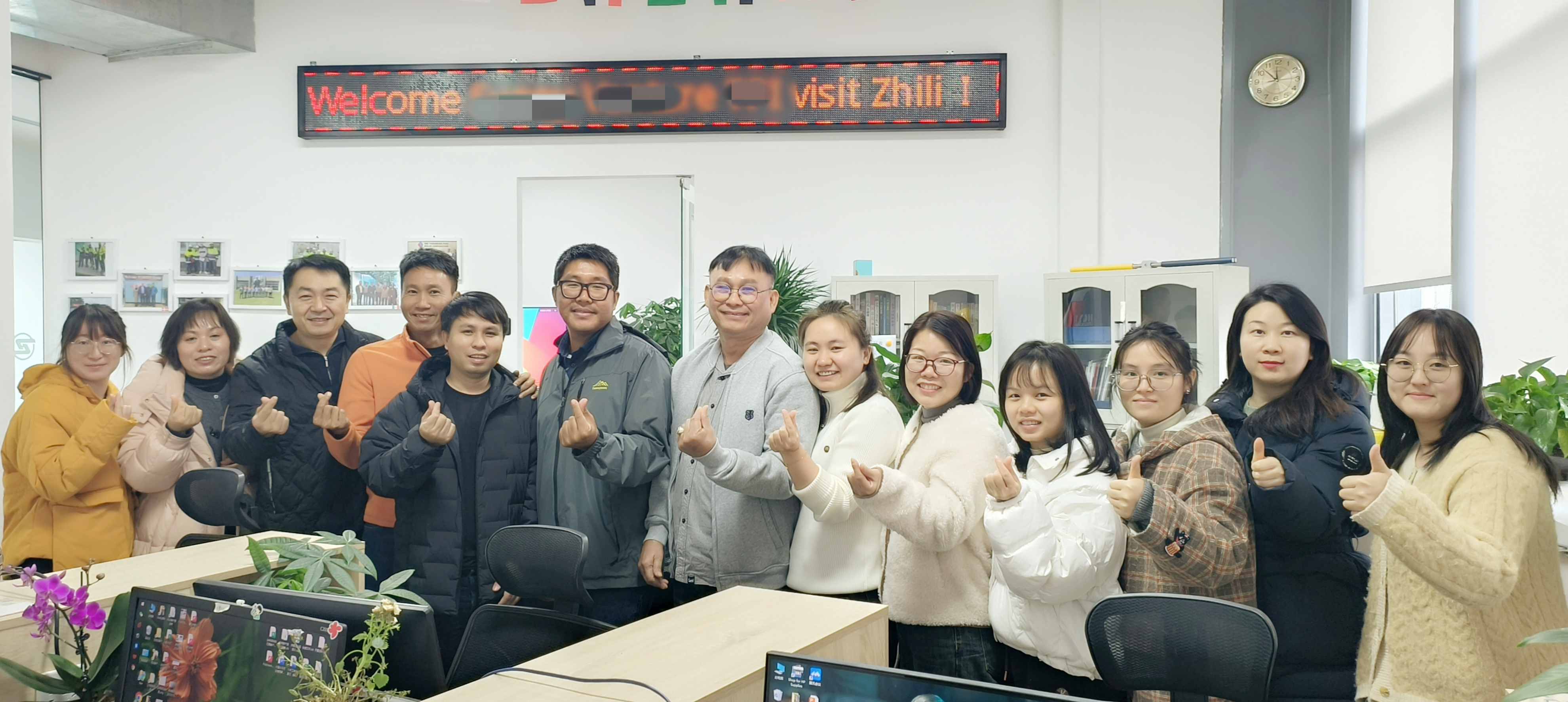 Thai distributors hang Gilli Nev Materials.jpg