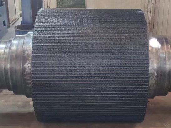 Roller press for surface welding of alloy studs.